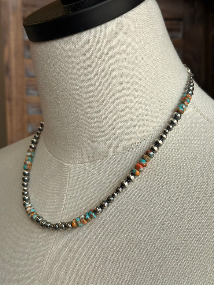 Sterling silver and turquoise spiny bead necklace close-up, graduated bead texture