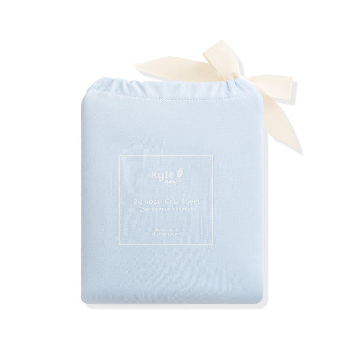 Crib Sheet in Breeze shown in its packaging
