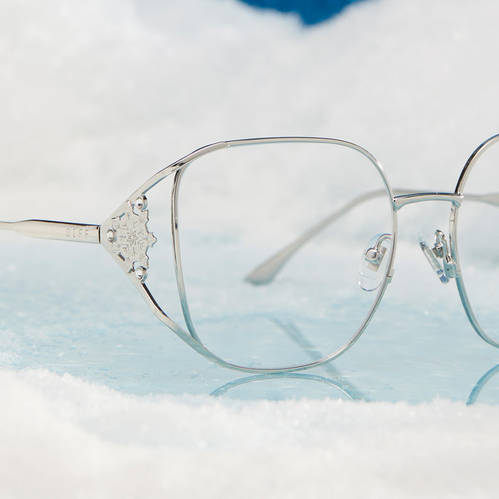 frozen x diff eyewear featuring the elsa oversized square prescription glasses with a cool silver gloss metal frame detailed angled view