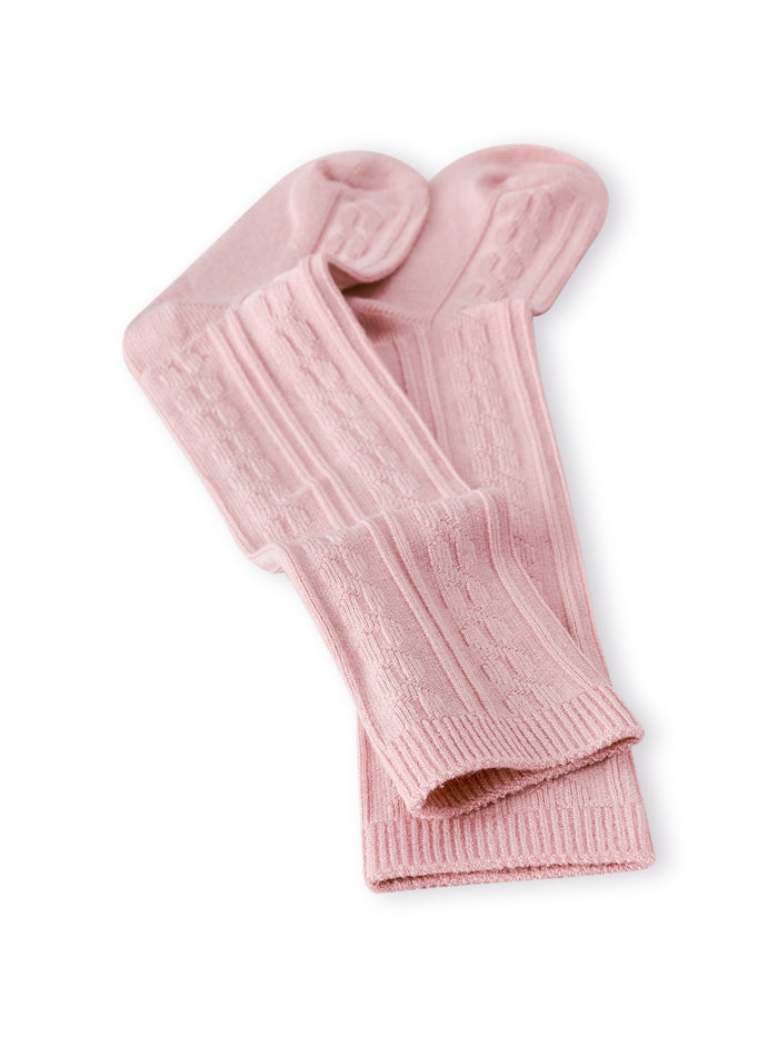 Knee high socks in cloud laying flat on a white background.