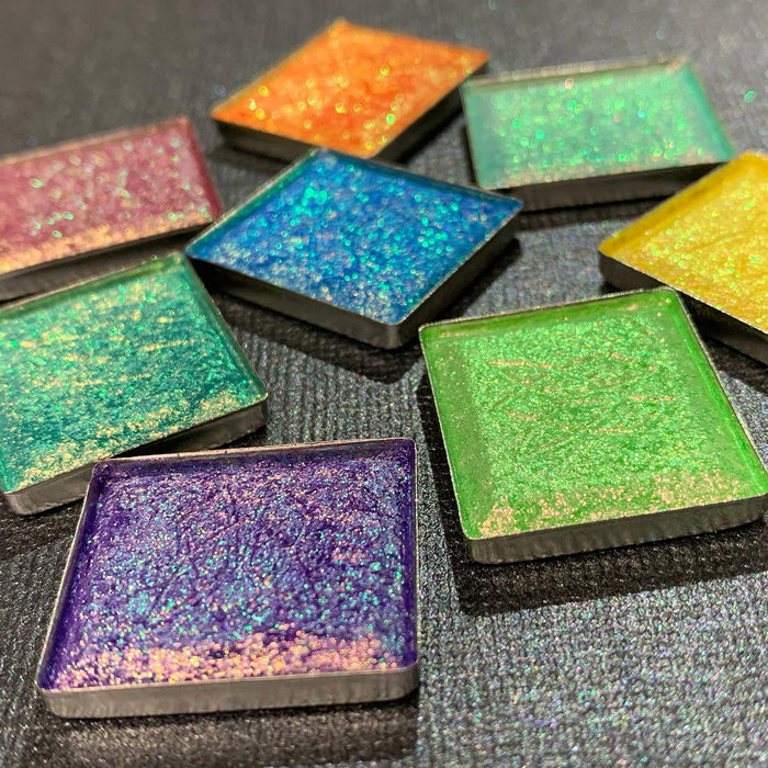 Low angled scattered Majesty Vibrant Multichrome Eyeshadow pan in Vibrant Multichrome Eyeshadow Bundle with Royalty, Throne, Heirloom, Courtyard, Lineage, Crown Jewel, Bloodline