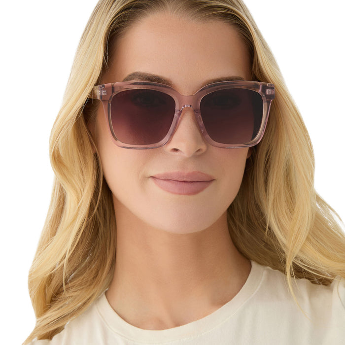 on model - female wearing diff eyewear featuring the meredith square sunglasses with a light pink crystal frame and wine gradient lenses front view