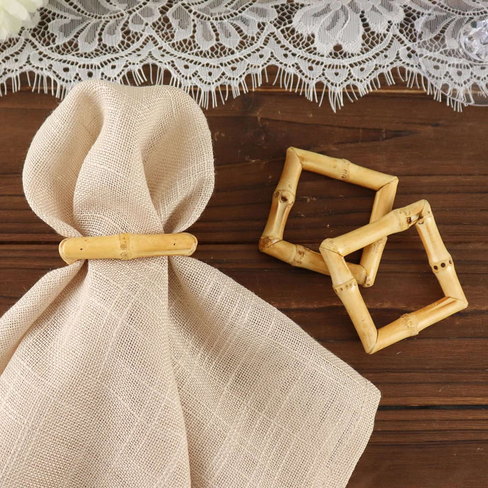 Bamboo napkin ring and decorative accents on a rustic wooden table.
