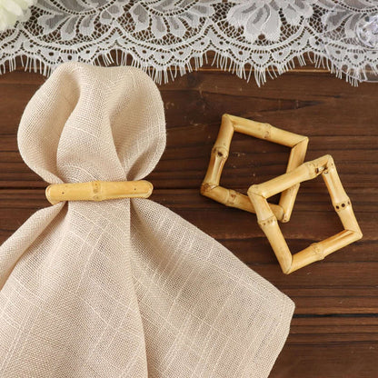 Bamboo napkin ring and decorative accents on a rustic wooden table.