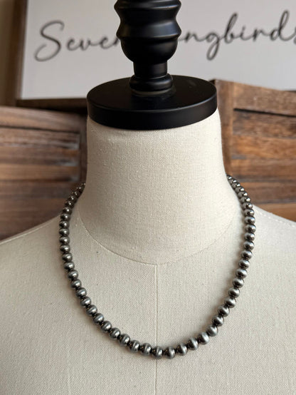 17-inch silver pearl bead necklace with evenly spaced round beads