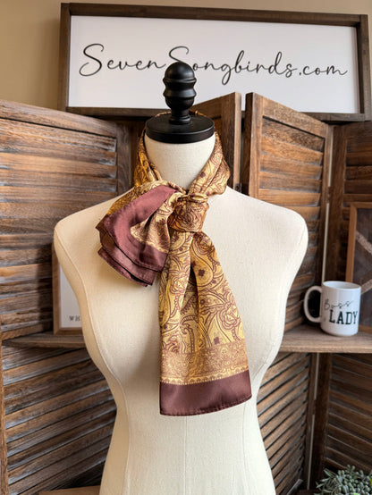 Gold paisley wild rag scarf with burgundy border and knotted bow detail