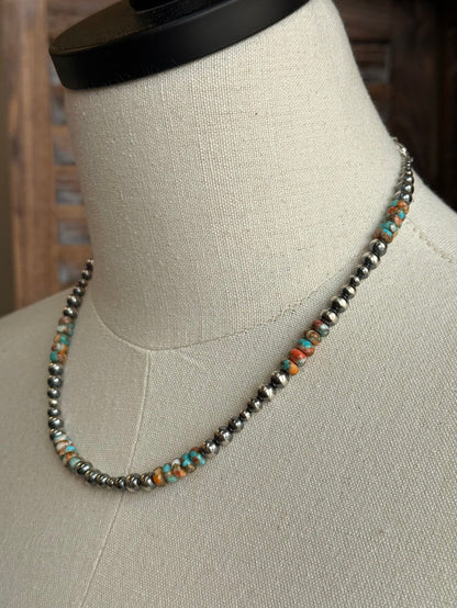Sterling silver and turquoise spiny bead necklace close-up, graduated bead texture