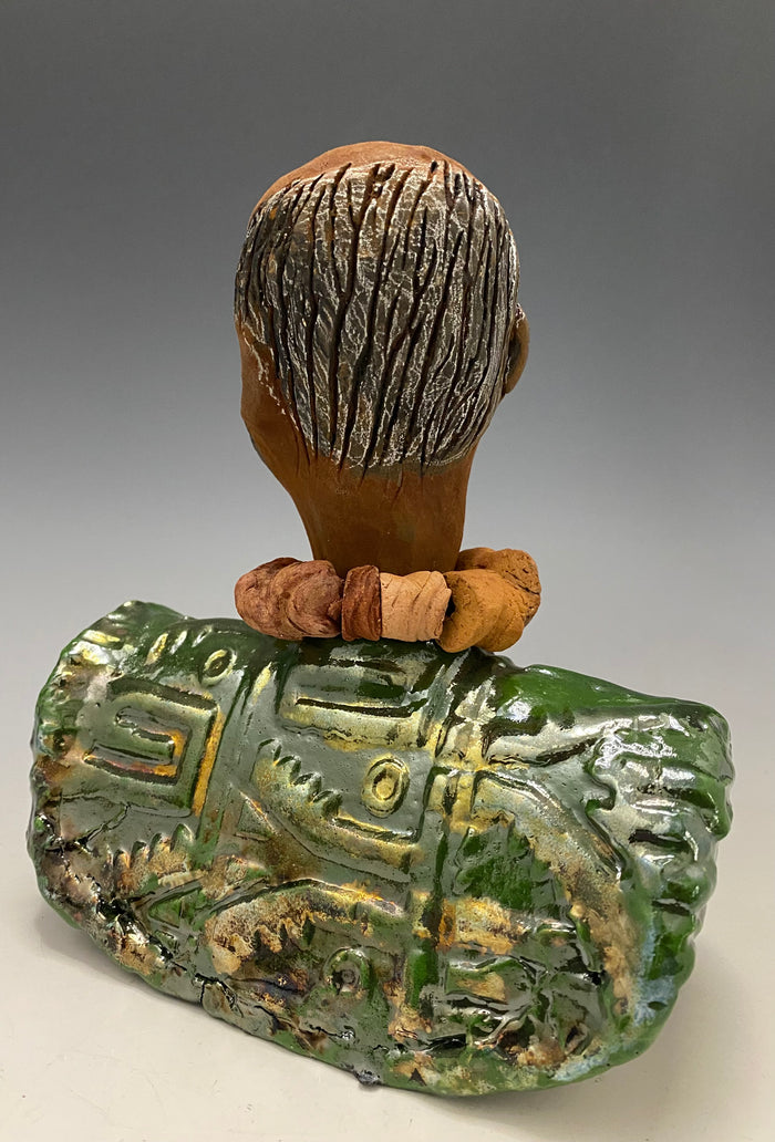 Learning to draw is really a matter of learning to see - to see correctly - and that means a good deal more than merely looking with the eye.- Lester Jones  Meet James! Albert stands 7.5" x 6" x 3" and weighs 2.5lbs. Albert wears a colorful metallic copper green dashiki. He is partially bald with a salt and peppered beard. Yes ,,,,,,He is one of few Men found in the Herdew collection!