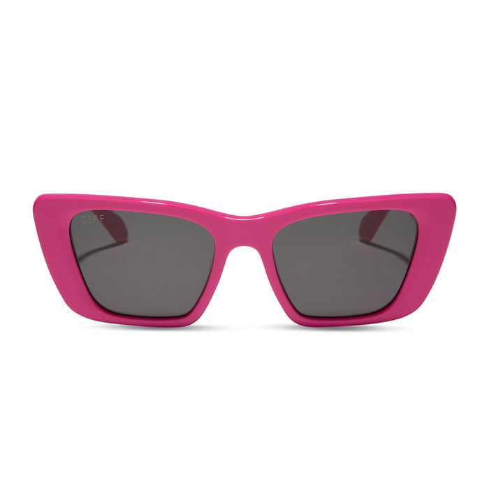 diff eyewear featuring the aura cat eye sunglasses with a bright pink frame and grey lenses front view