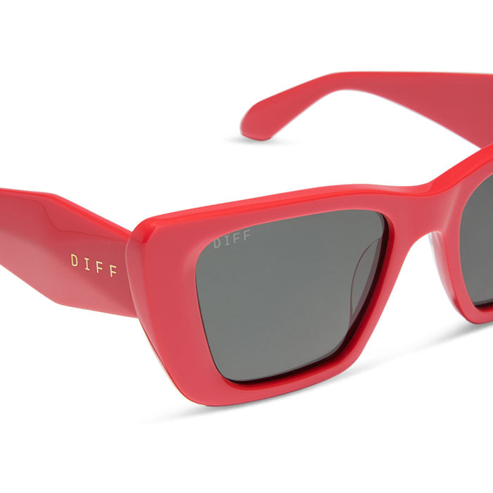 diff eyewear aura square sunglasses with a sunset red frame and grey polarized lenses detailed view
