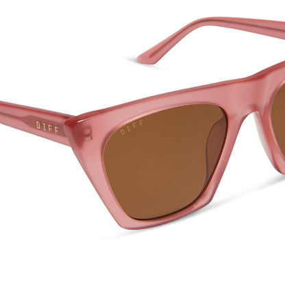 diff eyewear featuring the avril cat eye oversized sunglasses with a guava pink frame and brown lenses detailed view