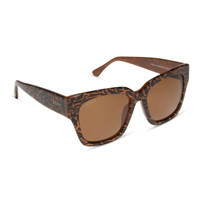 diff eyewear featuring the bella ii square sunglasses with a animal print frame and brown lenses angled view