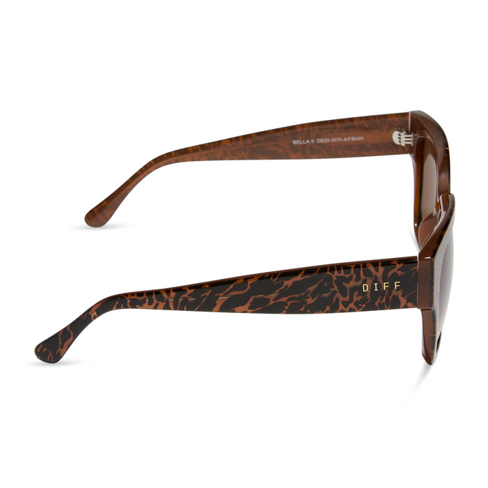 diff eyewear featuring the bella ii square sunglasses with a animal print frame and brown lenses side view