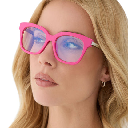 diff eyewear featuring the bella xs square glasses with a bright pink frame angled view