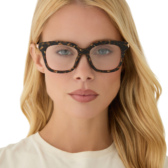 on model - blonde female wearing diff eyewear bella xs square glasses with a glitter tortoise frame front view