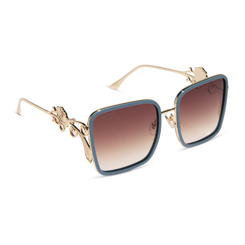 disney princess x diff eyewear featuring the belle 2.0 oversized square sunglasses with a gold and enchanting blue frame with brown gradient polarized lenses angled view