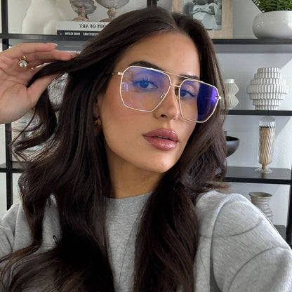 lifestyle - rachel boniske wearing gold wire frame eyeglasses