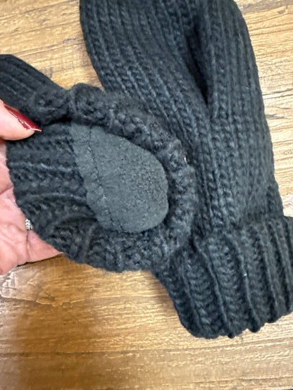 Knit mitten with ribbed cuff and dark palm patch, shown close-up