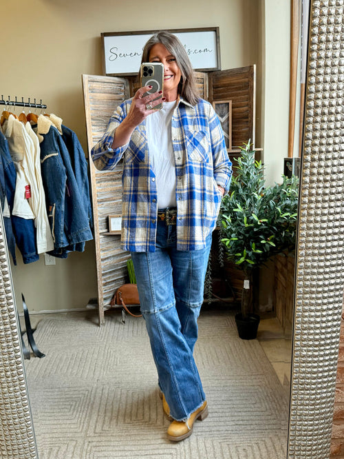 Blue plaid shacket with button-front and long sleeves, full-length view