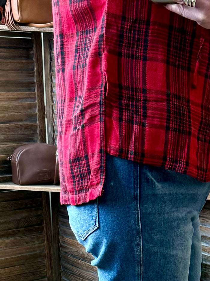 Red and black buffalo-plaid cotton shirt with button placket and curved hem