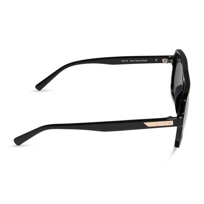 diff eyewear featuring the cameron navigator sunglasses with a black frame and grey polarized lenses side view