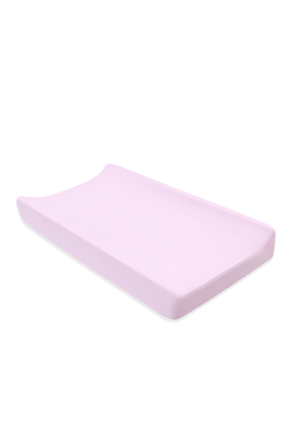 Purple baby changing pad on a white background