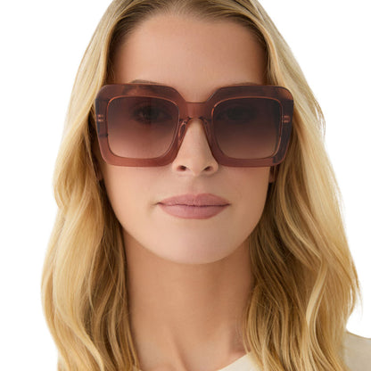 on model - female wearing diff eyewear featuring the charise square sunglasses with a café ole frame and brown gradient polarized lenses front view