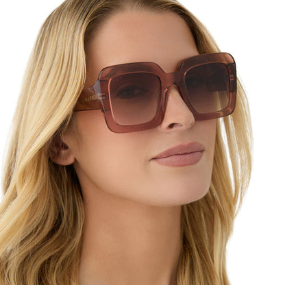 on model - female wearing diff eyewear featuring the charise square sunglasses with a café ole frame and brown gradient polarized lenses angled view