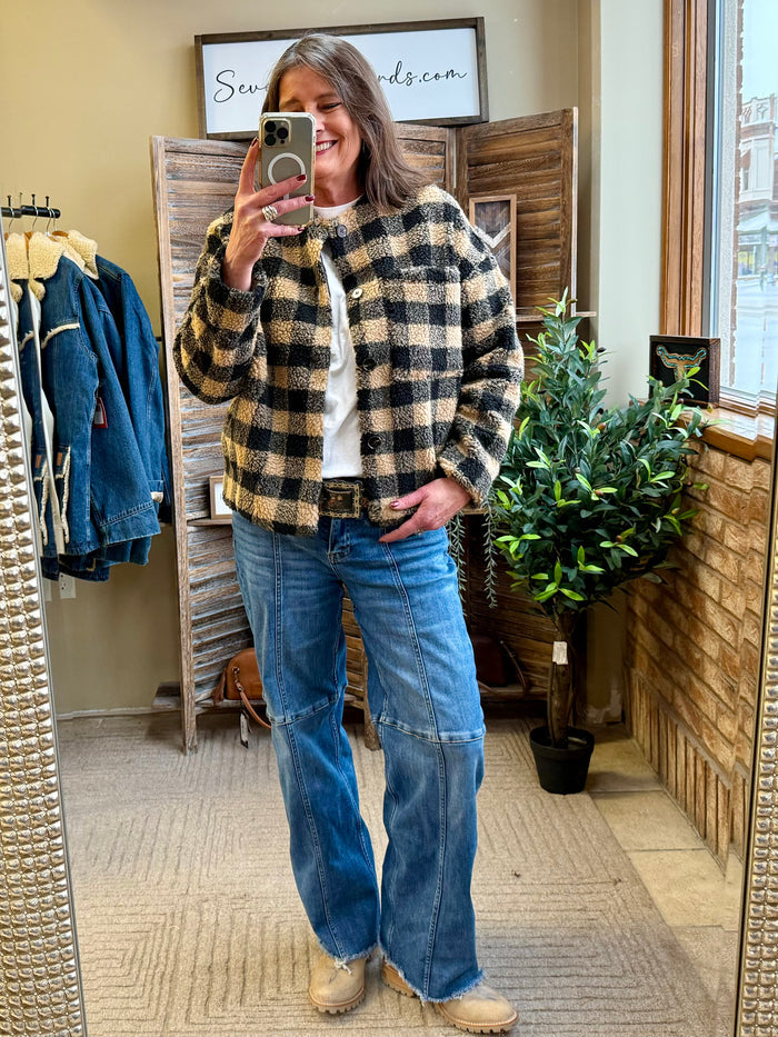 Checkered sherpa coat in black and tan with button front and cozy fleece texture