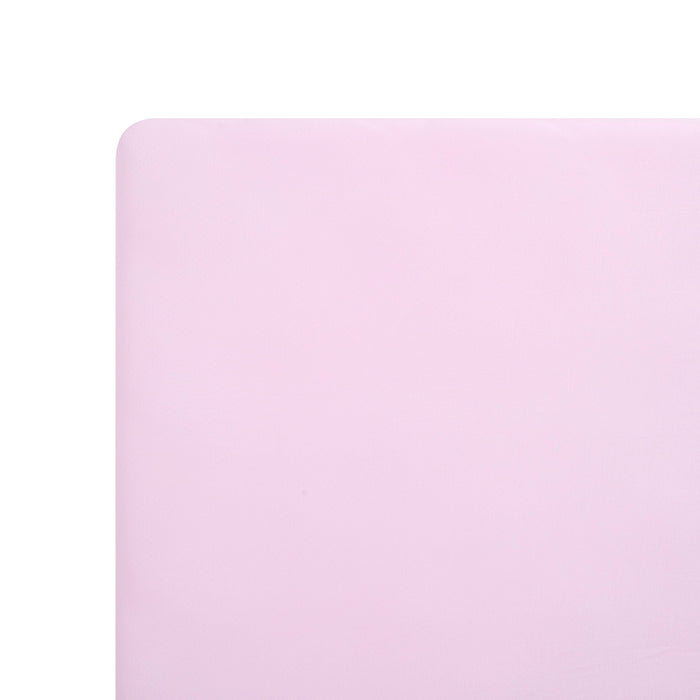 Light purple crib sheet on crib mattress