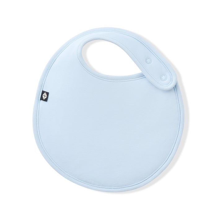 Font of the Cushy Bib in Breeze showing the snap closures