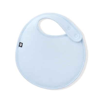 Font of the Cushy Bib in Breeze showing the snap closures