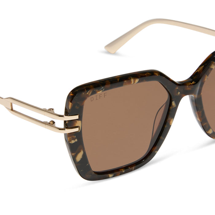 diff eyewear featuring the dasha square sunglasses with a glitter gold tortoise frame and brown lenses detailed view