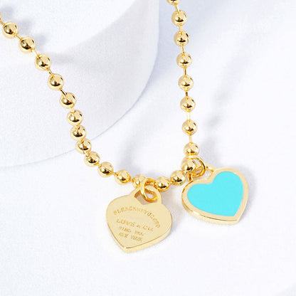 DOUBLE HEARTS ON BALL CHAIN - Gold