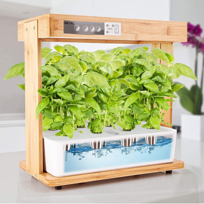 Duronic Hydroponic Growing System featuring a bamboo frame, built-in LED grow lights, and lush green basil plants growing in a water-filled reservoir.