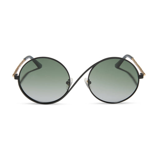 wicked x diff eyewear featuring the elphaba wire frames round sunglasses with a black frame and green lenses front view
