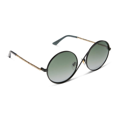 wicked x diff eyewear featuring the elphaba wire frames round sunglasses with a black frame and green lenses angled view