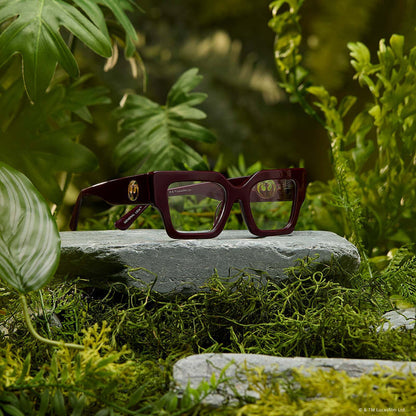 lifestyle - in a jungle star wars x diff eyewear featuring the general leia™ square prescription glasses with a aubergine purple frame front view