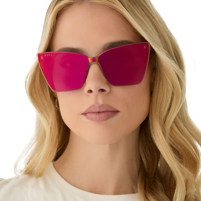 on model - female wearing diff eyewear featuring the goldie xs cat eye sunglasses with a animal print frame and red hot summer mirror lenses front view