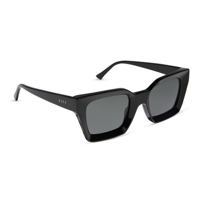 diff eyewear featuring the greer square sunglasses with a black frame and grey polarized lenses angled view