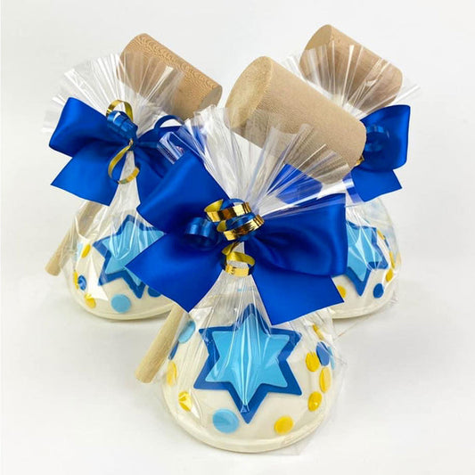 Hanukkah Piñata with a mallet wrapped in cellophane and ribbons