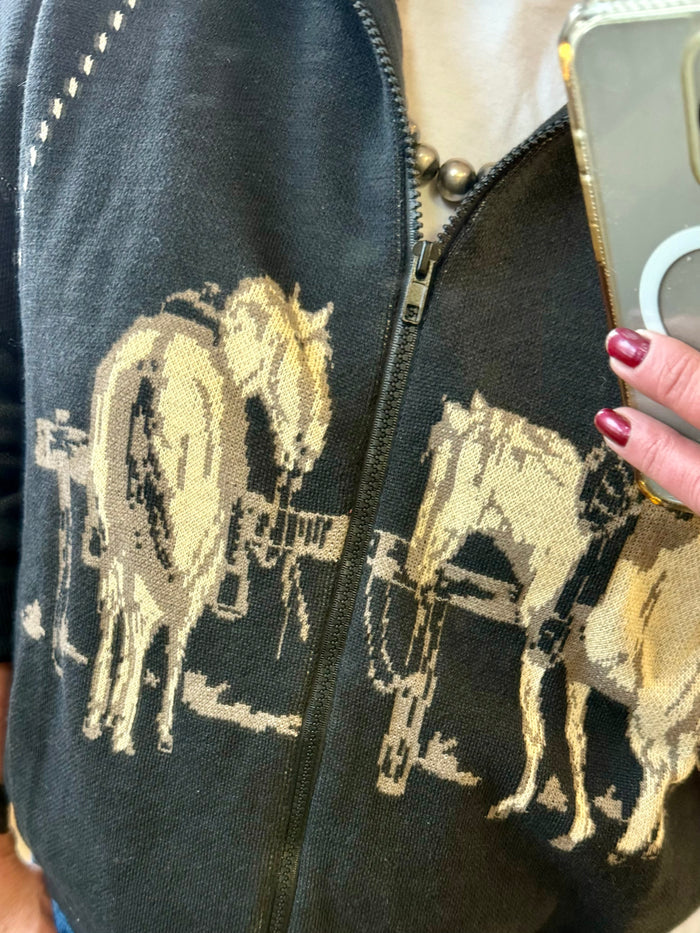 Dark zip-front hooded cardigan with beige horse-and-star western print