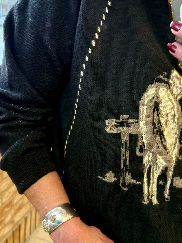 Dark zip cardigan sleeve with beige horse graphic and dotted stitch details