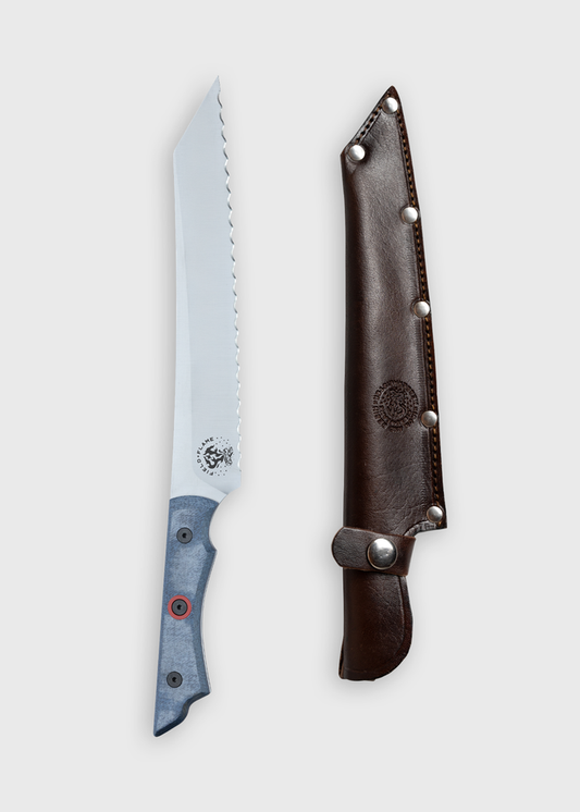 A sleek knife with a blue handle and a serrated blade beside a brown leather sheath on a plain background.