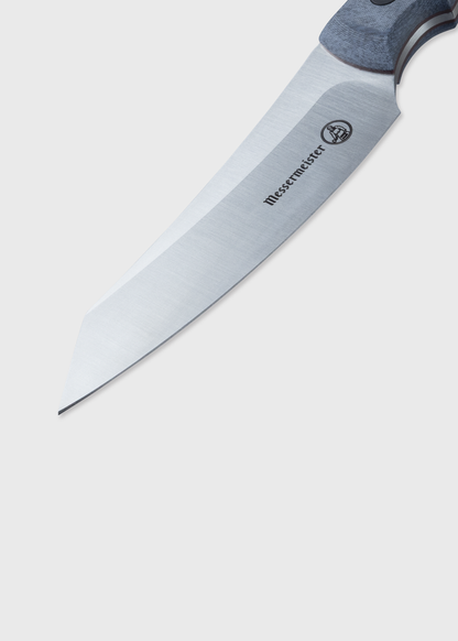 A sharp Messermeister knife with a sleek blade and ergonomic handle, set against a plain white background.