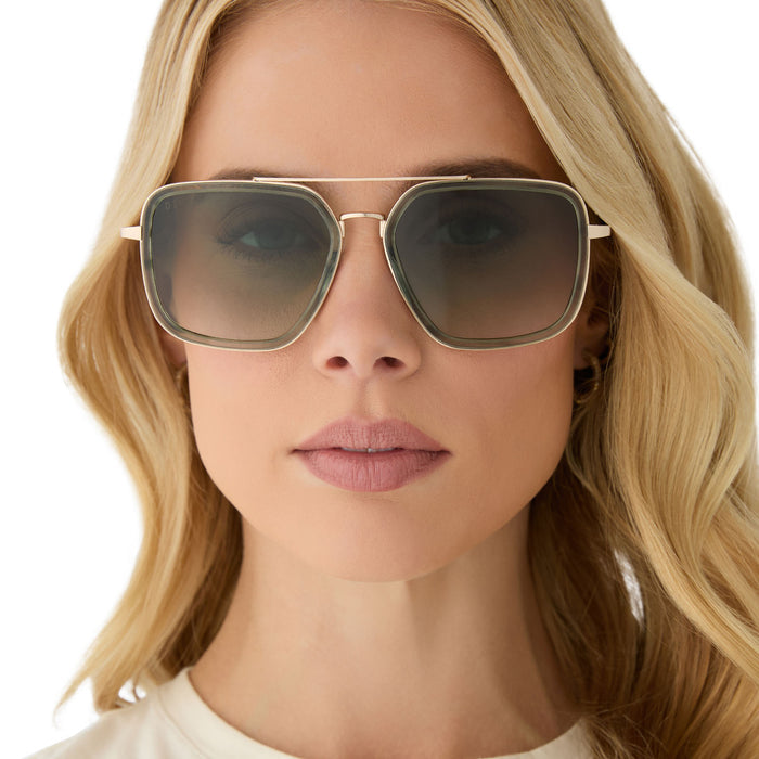 female wearing diff eyewear featuring the jordan navigator sunglasses with a cool matcha green frame and cool matcha gradient lenses front view