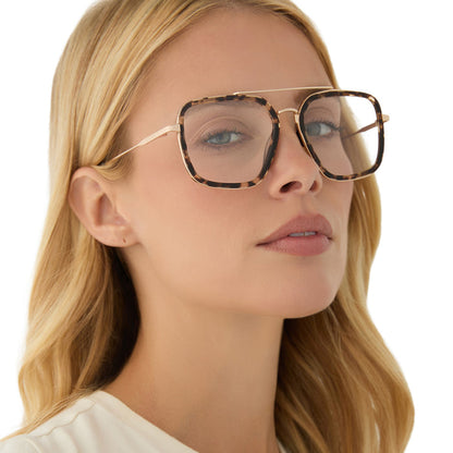 on model - blonde female wearing diff eyewear featuring the jordan navigator prescription glasses with a espresso tortoise frame angled view