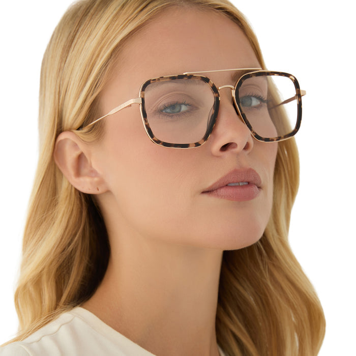 on model - blonde female wearing diff eyewear featuring the jordan navigator prescription glasses with a espresso tortoise frame angled view