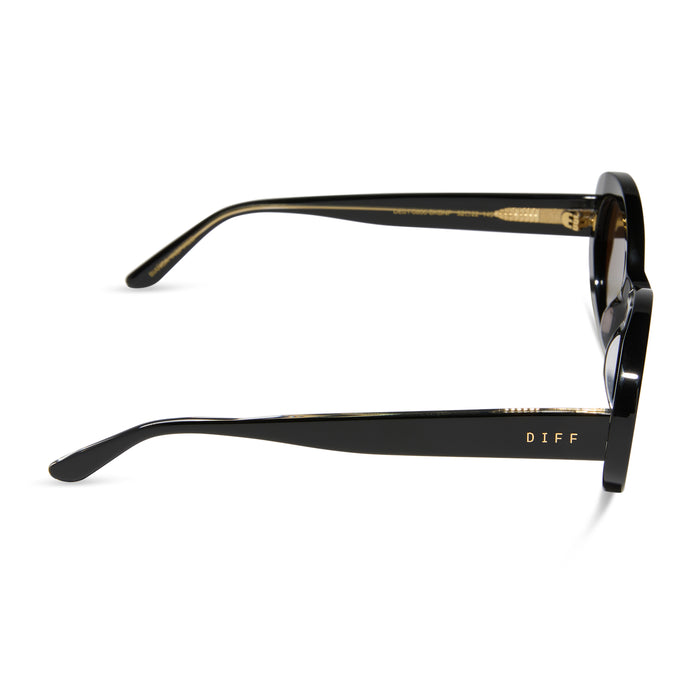 diff eyewear featuring the lainey oval sunglasses with a black frame and brown polarized lenses side view