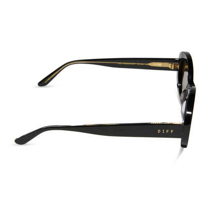 diff eyewear featuring the lainey oval sunglasses with a black frame and brown polarized lenses side view